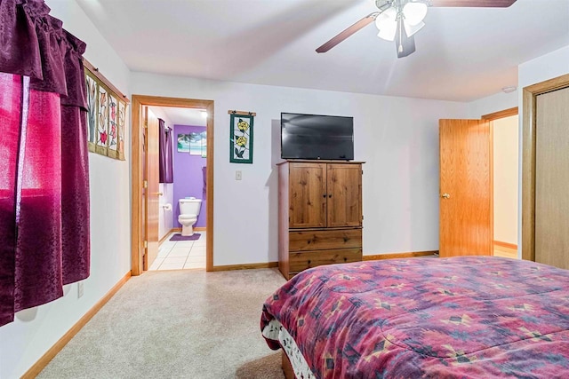 1809 S Badger Ct, Arkdale, WI 54613 - bedroom with carpet floors, ensuite bath, baseboards, and ceiling fan