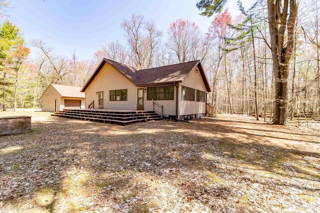 1809 S Badger Ct, Arkdale, WI 54613 - view of side of home featuring a sunroom and a deck