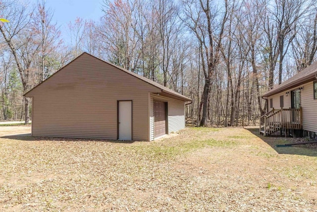 1809 S Badger Ct, Arkdale, WI 54613 - view of side of property with a detached garage and an outdoor structure