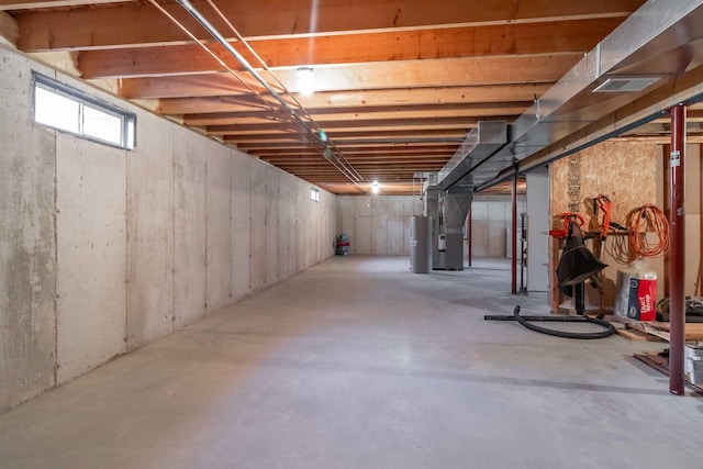 1809 S Badger Ct, Arkdale, WI 54613 - basement with heating unit and gas water heater