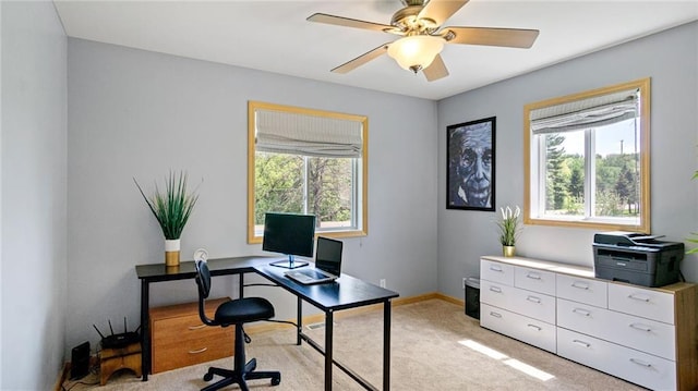 2649 W Menomonie St, Eau Claire, WI 54703 - home office featuring plenty of natural light, a ceiling fan, light carpet, and baseboards
