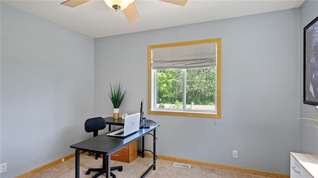 2649 W Menomonie St, Eau Claire, WI 54703 - home office with a ceiling fan, baseboards, and light carpet
