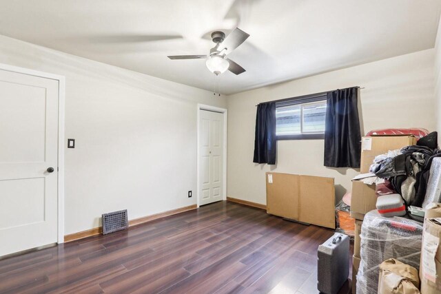 1728 W Capitol Dr, Milwaukee, WI 53206 - bedroom featuring wood finished floors, baseboards, and a ceiling fan