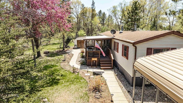 1870 County Road F Unit L69, Friendship, WI 53934 - view of front facade with roof with shingles