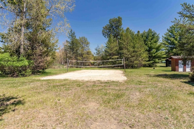 1870 County Road F Unit L69, Friendship, WI 53934 - view of community with volleyball court and a yard