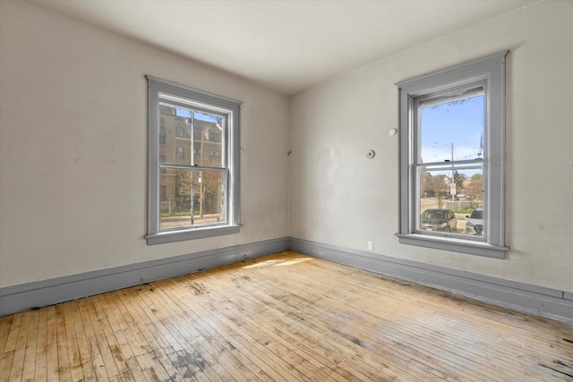 1341 S Layton Blvd Unit 1343, Milwaukee, WI 53215 - unfurnished room with hardwood / wood-style flooring and baseboards