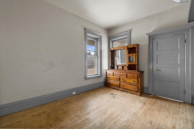 1341 S Layton Blvd Unit 1343, Milwaukee, WI 53215 - bedroom featuring wood-type flooring and baseboards