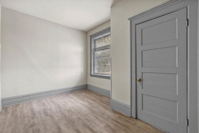 1341 S Layton Blvd Unit 1343, Milwaukee, WI 53215 - empty room with wood finished floors and baseboards