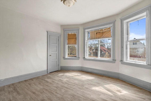 1341 S Layton Blvd Unit 1343, Milwaukee, WI 53215 - empty room with wood finished floors and baseboards