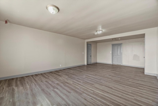 1341 S Layton Blvd Unit 1343, Milwaukee, WI 53215 - unfurnished room with wood finished floors and baseboards