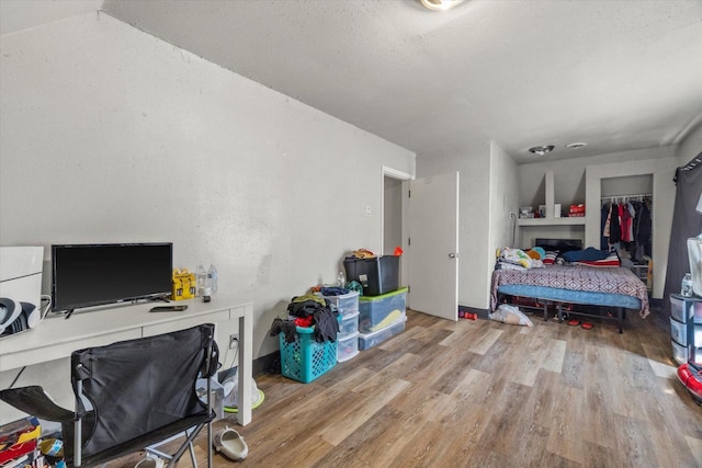 1341 S Layton Blvd Unit 1343, Milwaukee, WI 53215 - bedroom featuring wood finished floors and an office area
