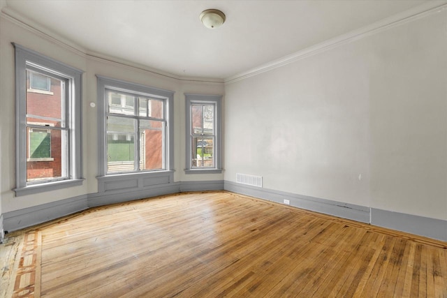 1341 S Layton Blvd Unit 1343, Milwaukee, WI 53215 - unfurnished room with hardwood / wood-style floors, ornamental molding, and baseboards