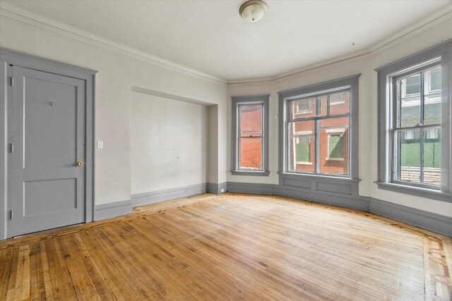 1341 S Layton Blvd Unit 1343, Milwaukee, WI 53215 - empty room featuring crown molding and wood finished floors