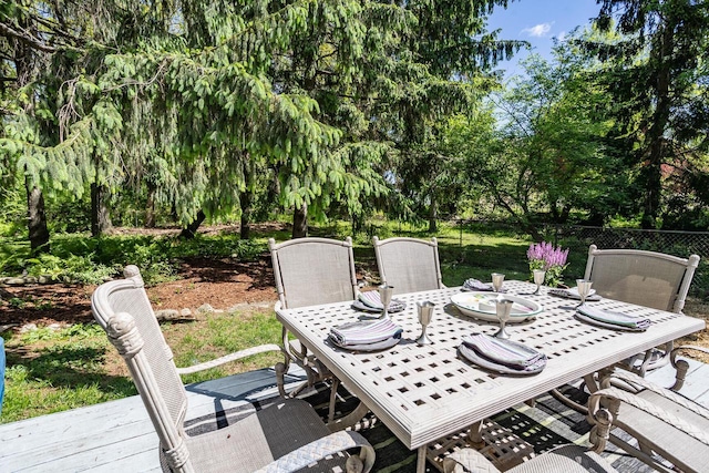 N56W27528 Lisbon Rd, Lisbon, WI 53089 - deck featuring outdoor dining area and view of scattered trees