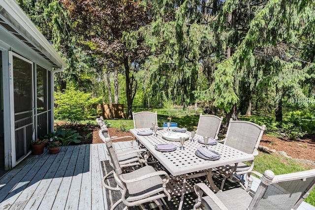 N56W27528 Lisbon Rd, Lisbon, WI 53089 - wooden terrace featuring outdoor dining area and view of scattered trees
