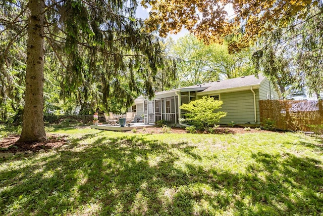N56W27528 Lisbon Rd, Lisbon, WI 53089 - view of yard with a sunroom and a deck