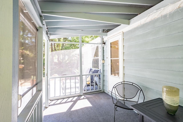 N56W27528 Lisbon Rd, Lisbon, WI 53089 - unfurnished sunroom featuring beam ceiling