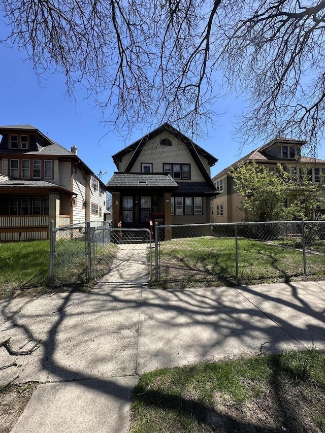 3158 N 39th St Unit 3160, Milwaukee, WI 53216 - dutch colonial featuring a gate and a fenced front yard