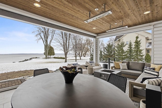536 Sunrise Bay Rd, Neenah, WI 54956 - view of patio / terrace with outdoor dining space, an outdoor living space with a fire pit, and a water view