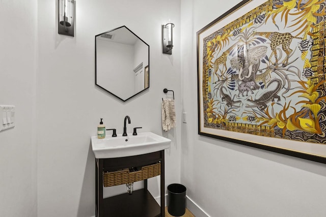 536 Sunrise Bay Rd, Neenah, WI 54956 - bathroom featuring a sink and baseboards