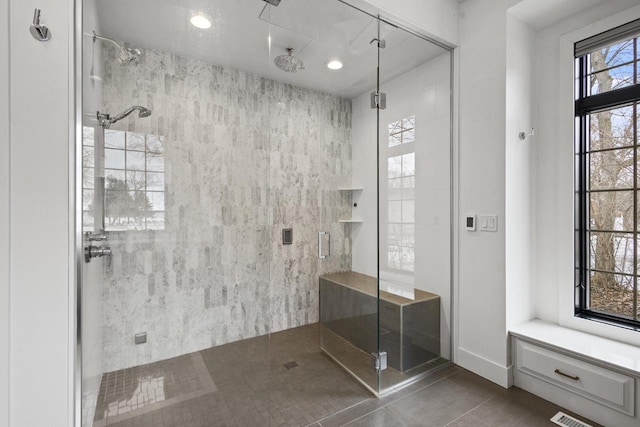 536 Sunrise Bay Rd, Neenah, WI 54956 - bathroom featuring tile patterned floors, a stall shower, and recessed lighting