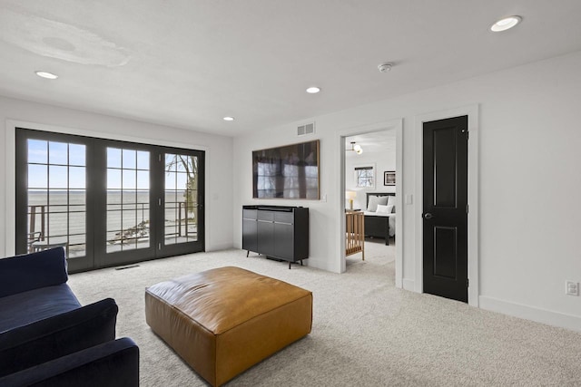 536 Sunrise Bay Rd, Neenah, WI 54956 - living room with light colored carpet, recessed lighting, and baseboards
