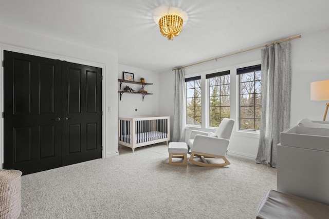 536 Sunrise Bay Rd, Neenah, WI 54956 - sitting room featuring carpet, baseboards, and a chandelier