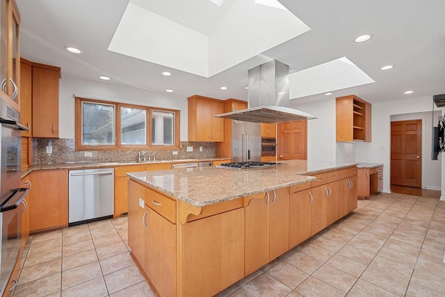 7515 N Beach Dr, Fox Point, WI 53217 - kitchen featuring stainless steel appliances, a skylight, island range hood, open shelves, and recessed lighting