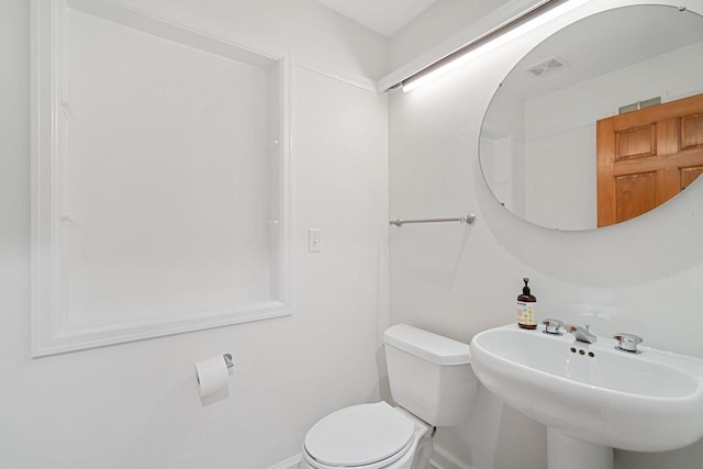 7515 N Beach Dr, Fox Point, WI 53217 - bathroom with a sink, toilet, and baseboards