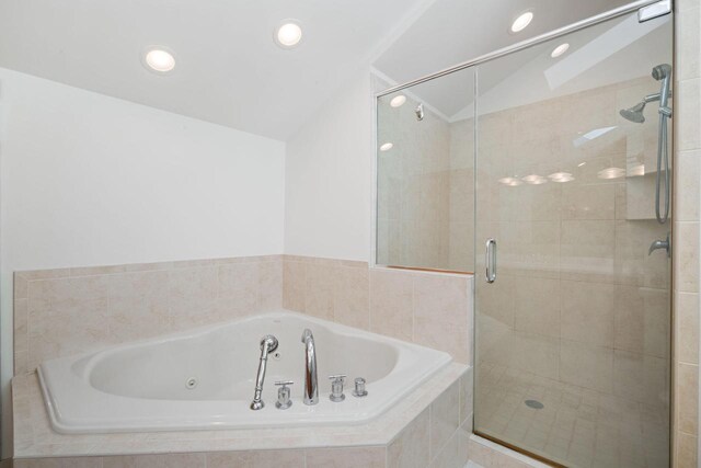 7515 N Beach Dr, Fox Point, WI 53217 - full bath with vaulted ceiling, a shower stall, a whirlpool tub, and recessed lighting