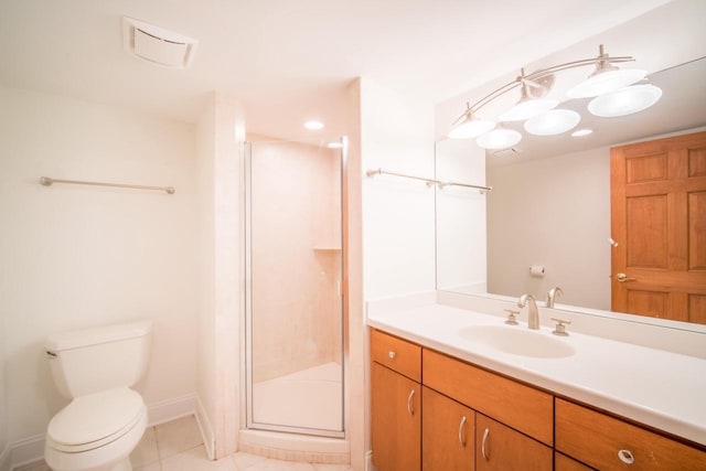 7515 N Beach Dr, Fox Point, WI 53217 - bathroom featuring a shower stall, toilet, tile patterned floors, vanity, and baseboards