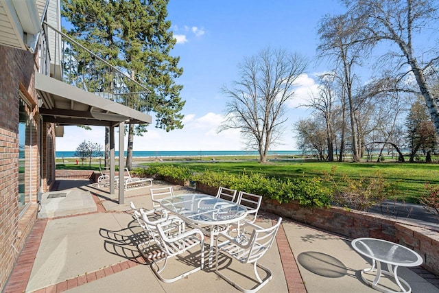 7515 N Beach Dr, Fox Point, WI 53217 - view of patio featuring a water view and outdoor dining space