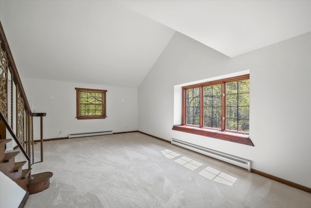 1401 Scenic Dr, Hubertus, WI 53033 - bonus room with a baseboard heating unit, carpet, stairs, baseboards, and lofted ceiling