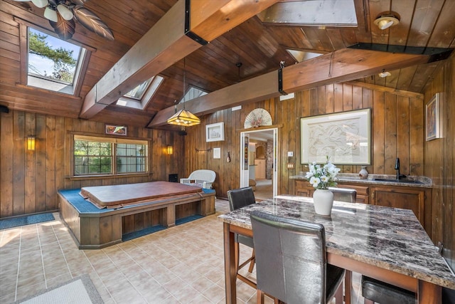 1401 Scenic Dr, Hubertus, WI 53033 - playroom featuring a skylight, a sink, wooden walls, beamed ceiling, and wooden ceiling