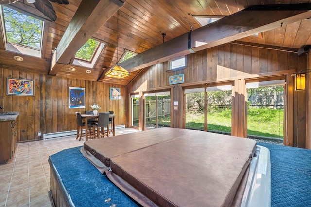 1401 Scenic Dr, Hubertus, WI 53033 - rec room featuring baseboard heating, a skylight, wooden ceiling, wooden walls, and light tile patterned flooring