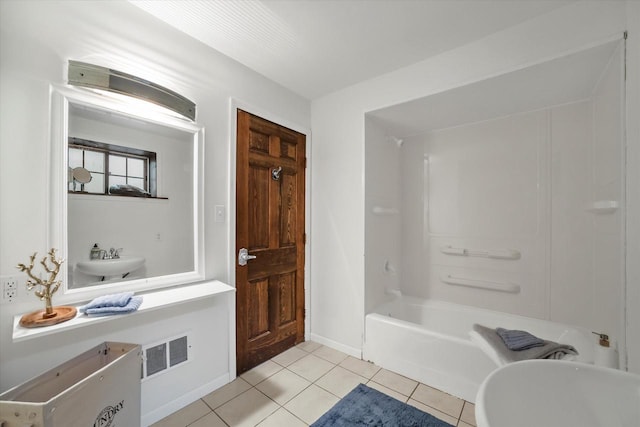 1401 Scenic Dr, Hubertus, WI 53033 - bathroom featuring tile patterned floors, baseboards, and a sink
