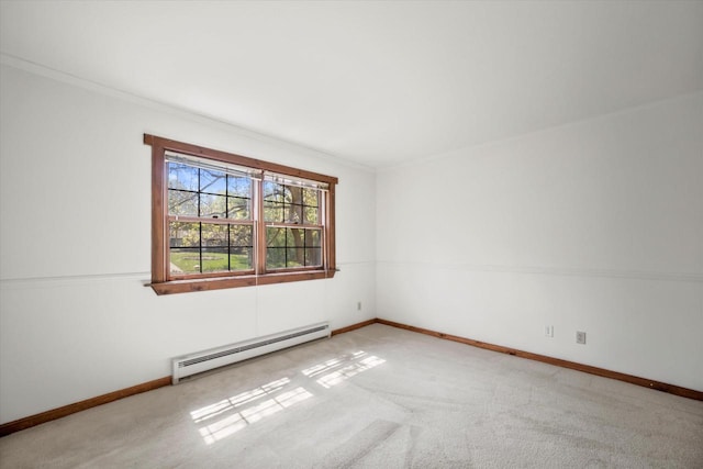 1401 Scenic Dr, Hubertus, WI 53033 - carpeted empty room featuring a baseboard radiator, baseboards, and crown molding