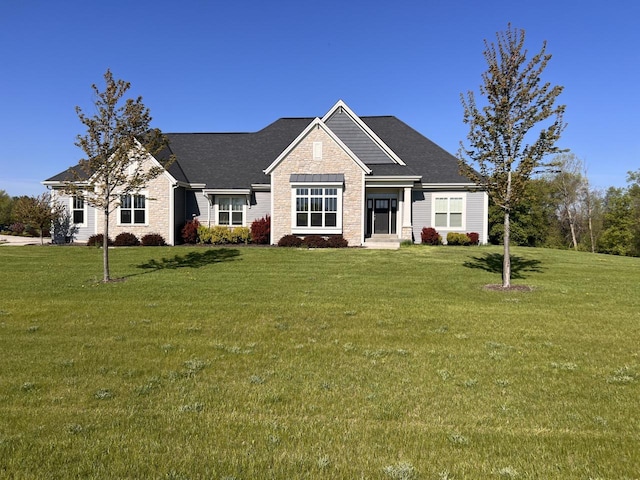 S89W35217 Amber Ct, Eagle, WI 53119 - view of front of house featuring a front yard and stone siding