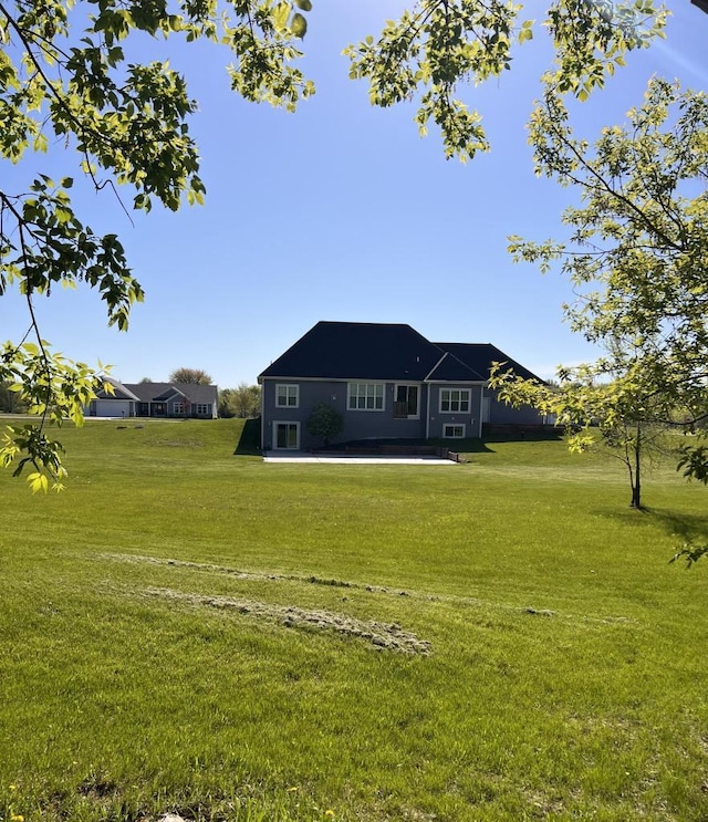 S89W35217 Amber Ct, Eagle, WI 53119 - back of house featuring a yard and a patio