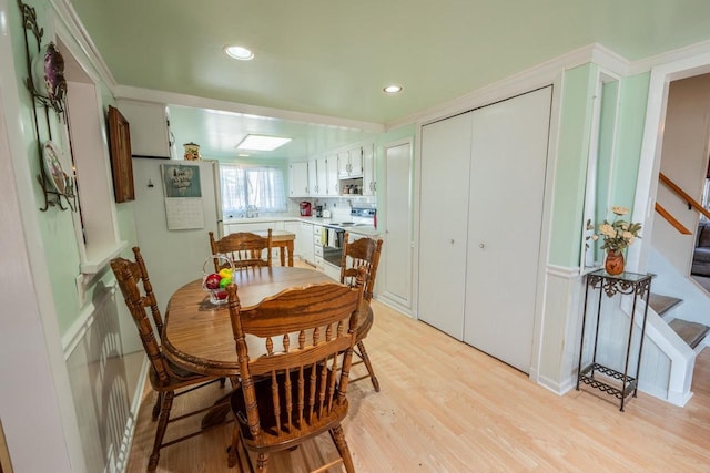 1226 Lake St, White Lake, WI 54491 - dining space with stairs, light wood-type flooring, and recessed lighting