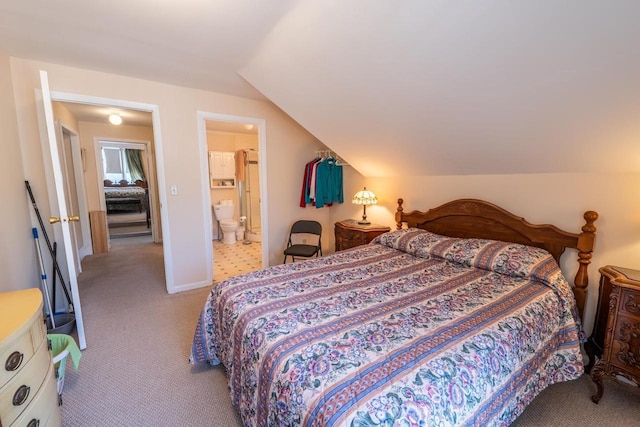 1226 Lake St, White Lake, WI 54491 - carpeted bedroom featuring vaulted ceiling, ensuite bathroom, and baseboards