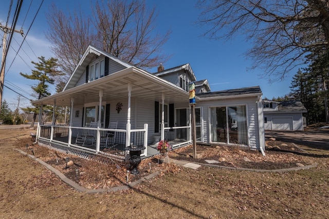 1226 Lake St, White Lake, WI 54491 - view of front of home with covered porch and a chimney