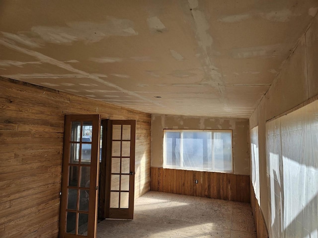 1226 Lake St, White Lake, WI 54491 - empty room featuring wooden walls and french doors