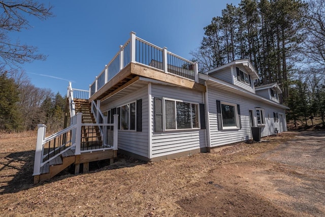 1226 Lake St, White Lake, WI 54491 - view of home's exterior featuring stairs and a deck