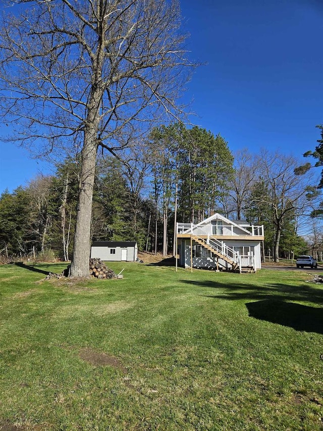 1226 Lake St, White Lake, WI 54491 - view of green lawn with a deck