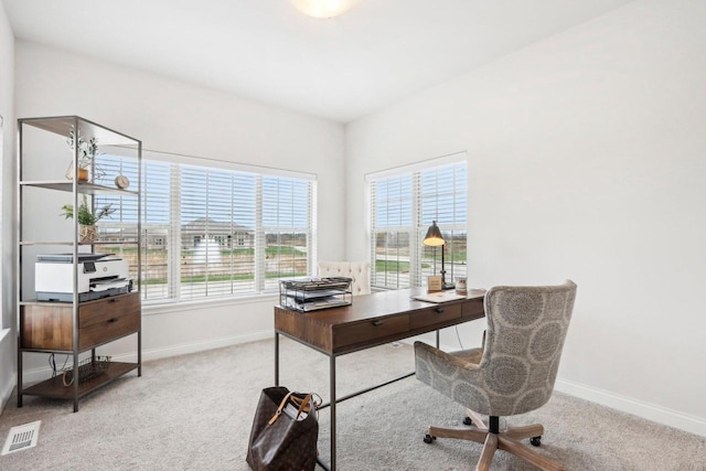 W139S9977 Jay Dr, Muskego, WI 53150 - carpeted home office featuring healthy amount of natural light and baseboards