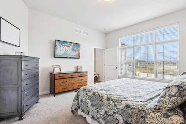 W139S9977 Jay Dr, Muskego, WI 53150 - bedroom featuring light carpet and baseboards