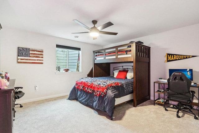 W139S9977 Jay Dr, Muskego, WI 53150 - carpeted bedroom with baseboards, an office area, and a ceiling fan