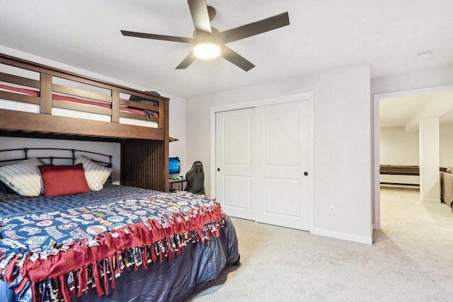 W139S9977 Jay Dr, Muskego, WI 53150 - bedroom featuring carpet flooring, a closet, baseboards, and a ceiling fan