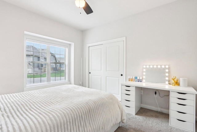 W139S9977 Jay Dr, Muskego, WI 53150 - bedroom featuring light carpet, a closet, an office area, a ceiling fan, and baseboards